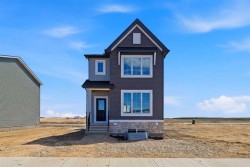 67 Huxland Road  Calgary, AB T2A 6Z7