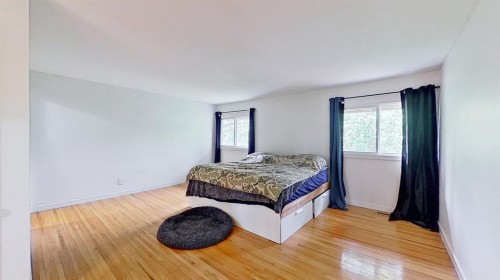 101-1305 Glenmore Trail, Calgary, AB - Indoor Photo Showing Bedroom
