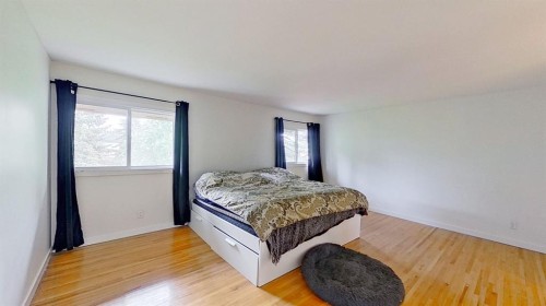101-1305 Glenmore Trail, Calgary, AB - Indoor Photo Showing Bedroom