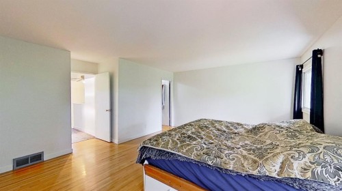 101-1305 Glenmore Trail, Calgary, AB - Indoor Photo Showing Bedroom