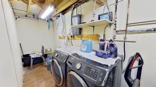 101-1305 Glenmore Trail, Calgary, AB - Indoor Photo Showing Laundry Room