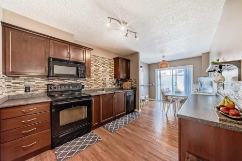 173 Eversyde Common Sw, Calgary, AB - Indoor Photo Showing Kitchen