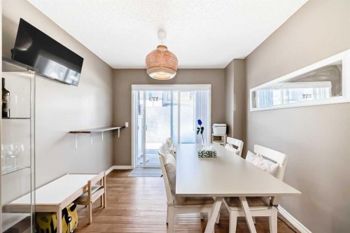 173 Eversyde Common Sw, Calgary, AB - Indoor Photo Showing Dining Room