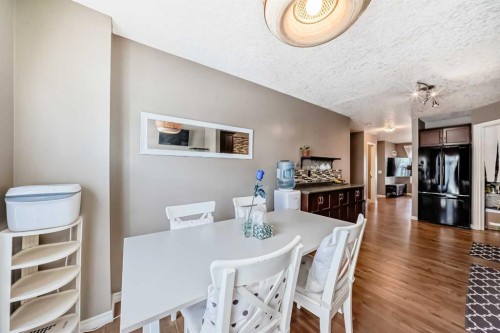 173 Eversyde Common Sw, Calgary, AB - Indoor Photo Showing Dining Room