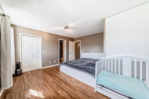 173 Eversyde Common Sw, Calgary, AB - Indoor Photo Showing Bedroom