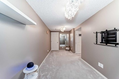 173 Eversyde Common Sw, Calgary, AB - Indoor Photo Showing Other Room
