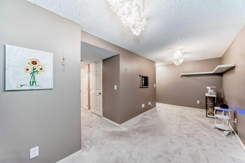 173 Eversyde Common Sw, Calgary, AB - Indoor Photo Showing Other Room