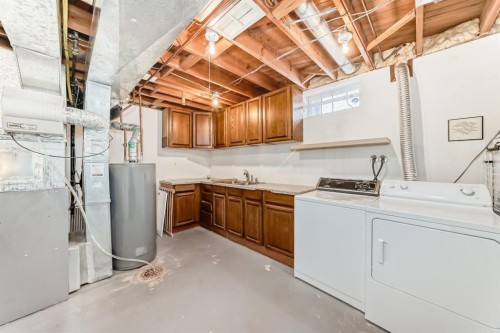 6739 Coach Hill Road Sw, Calgary, AB - Indoor Photo Showing Laundry Room
