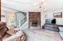 6739 Coach Hill Road Sw, Calgary, AB  - Indoor Photo Showing Living Room With Fireplace 