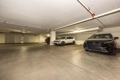 516-8505 Broadcast Avenue Sw, Calgary, AB - Indoor Photo Showing Garage