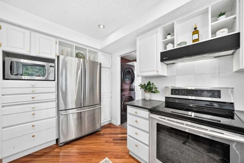 28 Woodmont Place Sw, Calgary, AB 