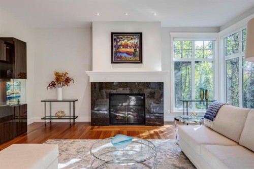 124 Posthill Drive Sw, Calgary, AB - Indoor Photo Showing Living Room With Fireplace