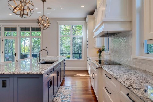 124 Posthill Drive Sw, Calgary, AB - Indoor Photo Showing Kitchen With Double Sink With Upgraded Kitchen