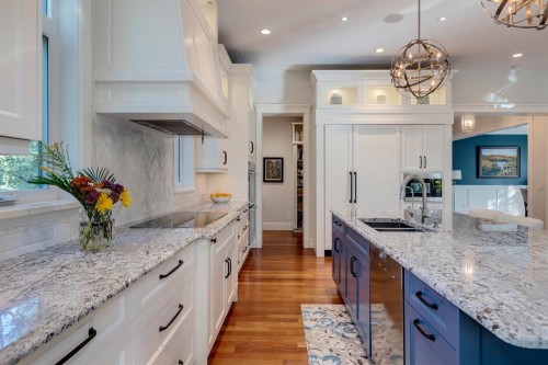 124 Posthill Drive Sw, Calgary, AB - Indoor Photo Showing Kitchen With Double Sink With Upgraded Kitchen