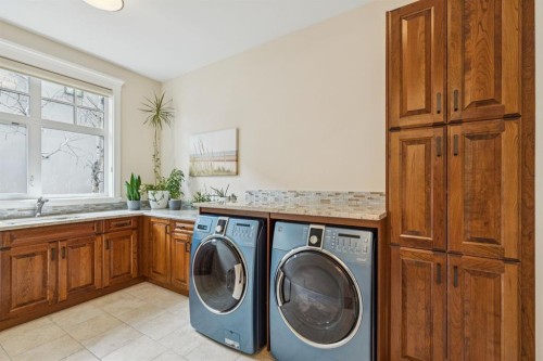 124 Posthill Drive Sw, Calgary, AB - Indoor Photo Showing Laundry Room