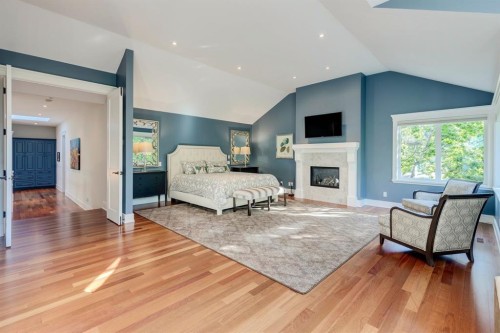 124 Posthill Drive Sw, Calgary, AB - Indoor With Fireplace