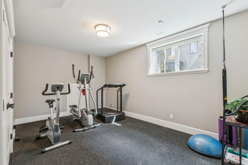 124 Posthill Drive Sw, Calgary, AB - Indoor Photo Showing Gym Room