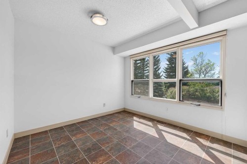 1-185 Woodridge Drive Sw, Calgary, AB 