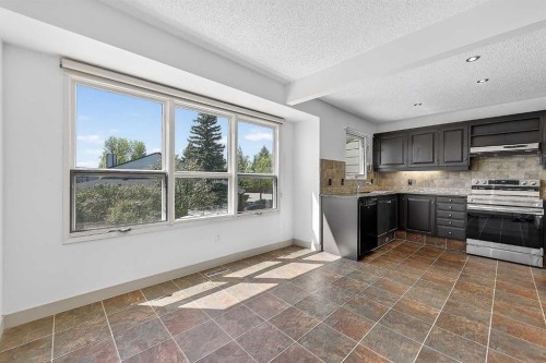 1-185 Woodridge Drive Sw, Calgary, AB 