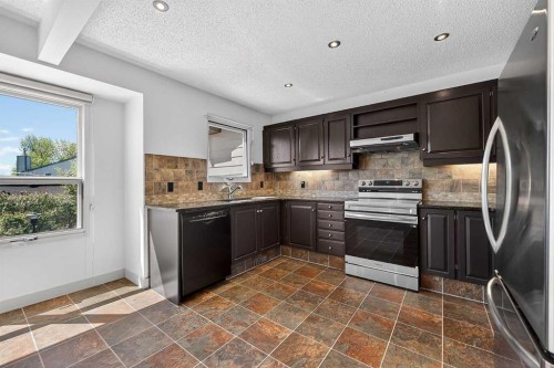 1-185 Woodridge Drive Sw, Calgary, AB 