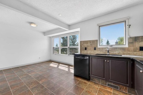 1-185 Woodridge Drive Sw, Calgary, AB 