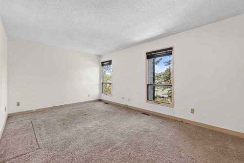 1-185 Woodridge Drive Sw, Calgary, AB 