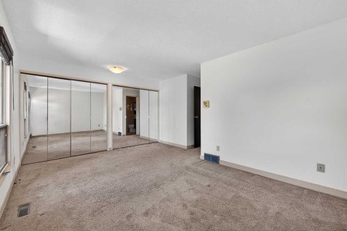 1-185 Woodridge Drive Sw, Calgary, AB 