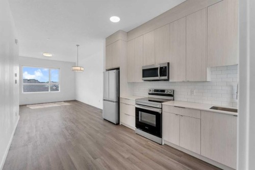 403-101 Panatella Square Nw, Calgary, AB 