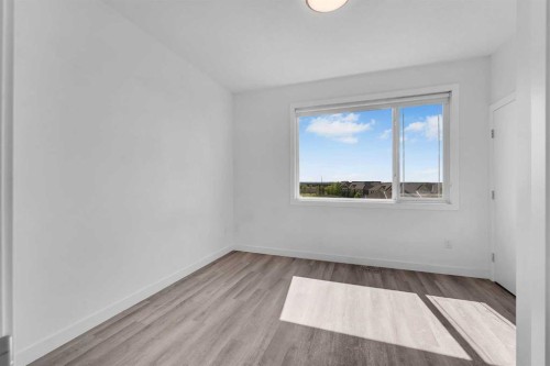 403-101 Panatella Square Nw, Calgary, AB 
