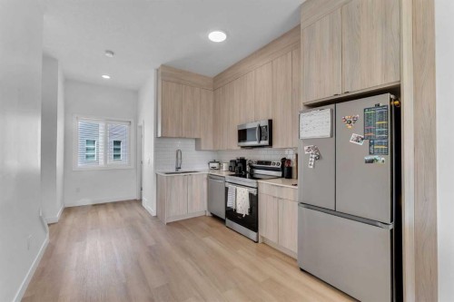406-101 Panatella Square Nw, Calgary, AB 