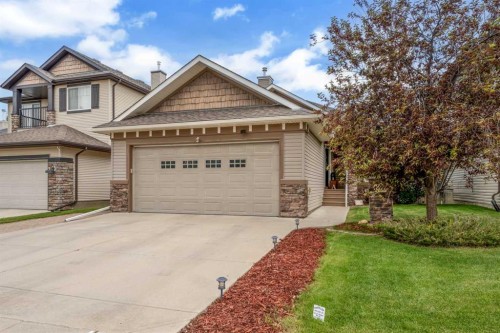 148 Cimarron Park Circle  Okotoks, AB T1S 2L6