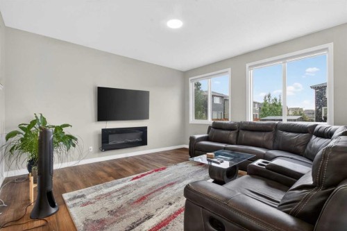 23 Red Sky Manor, Calgary, AB - Indoor Photo Showing Living Room With Fireplace
