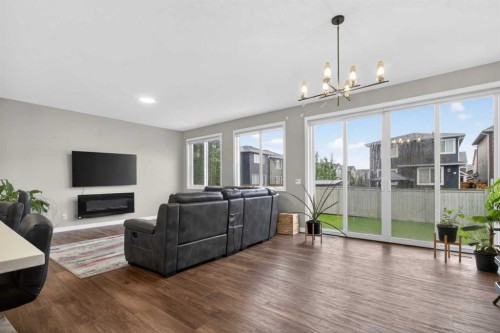 23 Red Sky Manor, Calgary, AB - Indoor Photo Showing Living Room With Fireplace