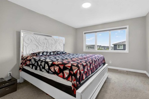 23 Red Sky Manor, Calgary, AB - Indoor Photo Showing Bedroom