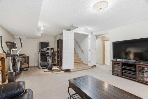 69 Chaparral Villas Se, Calgary, AB - Indoor Photo Showing Gym Room