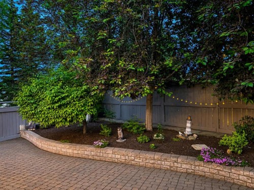 69 Chaparral Villas Se, Calgary, AB - Outdoor With Backyard