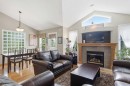69 Chaparral Villas Se, Calgary, AB  - Indoor Photo Showing Living Room With Fireplace 