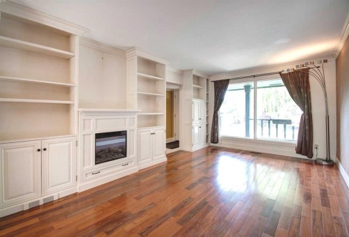 294 Southampton Drive Sw, Calgary, AB - Indoor Photo Showing Other Room With Fireplace