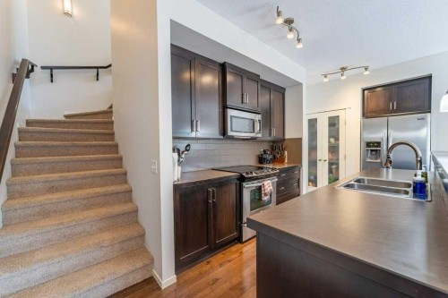 13 Mahogany Terrace Se, Calgary, AB - Indoor Photo Showing Kitchen With Double Sink With Upgraded Kitchen