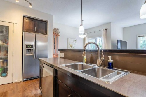 13 Mahogany Terrace Se, Calgary, AB - Indoor Photo Showing Kitchen With Double Sink
