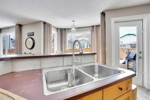 251 Lakeview Cove, Chestermere, AB - Indoor Photo Showing Kitchen With Double Sink