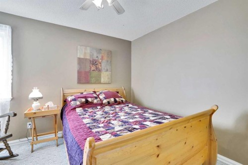 251 Lakeview Cove, Chestermere, AB - Indoor Photo Showing Bedroom