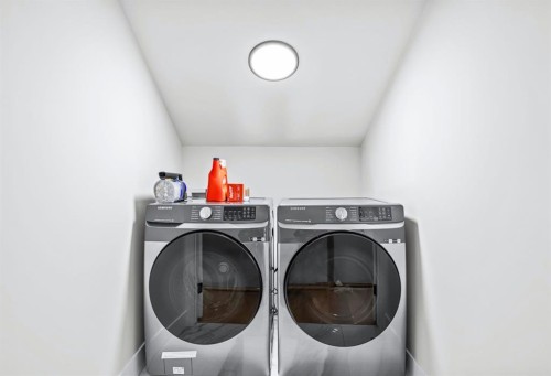 1-826 7Th Street, Canmore, AB - Indoor Photo Showing Laundry Room