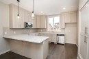 504 Kitstone Gate, Carstairs, AB  - Indoor Photo Showing Kitchen With Upgraded Kitchen 