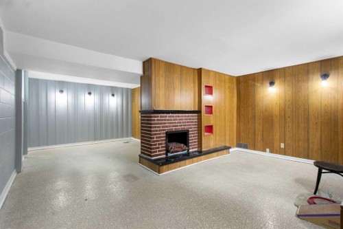 1622 Strathcona Street, Crossfield, AB - Indoor With Fireplace