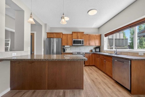 52 Reunion Close Nw, Airdrie, AB - Indoor Photo Showing Kitchen With Stainless Steel Kitchen With Double Sink