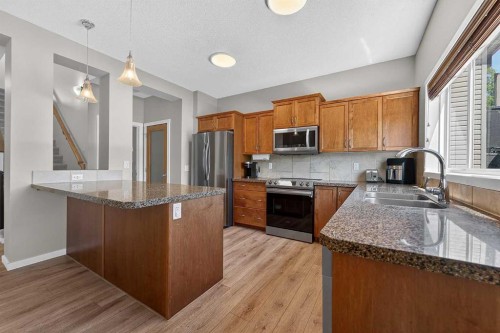52 Reunion Close Nw, Airdrie, AB - Indoor Photo Showing Kitchen With Stainless Steel Kitchen With Double Sink