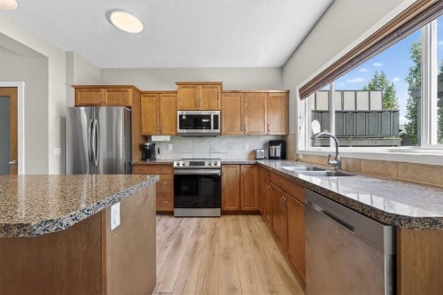 52 Reunion Close Nw, Airdrie, AB - Indoor Photo Showing Kitchen With Stainless Steel Kitchen With Double Sink