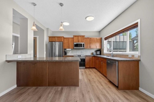 52 Reunion Close Nw, Airdrie, AB - Indoor Photo Showing Kitchen With Stainless Steel Kitchen