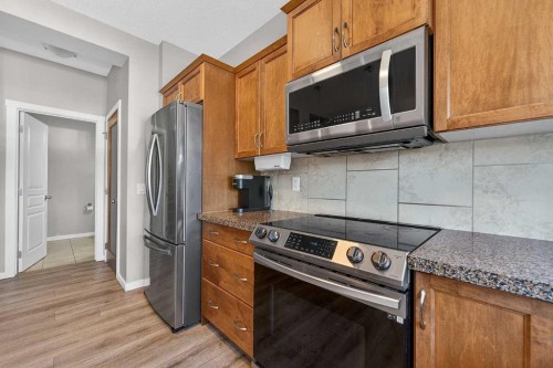 52 Reunion Close Nw, Airdrie, AB - Indoor Photo Showing Kitchen With Stainless Steel Kitchen